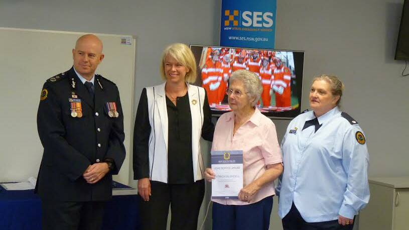 VALID RECIPIENT: (from left) NSW Deputy Commissioner for the SES, Greg Newton, local Member, Katrina Hodgkinson MP with Pat Blundell and Ros Bickford.