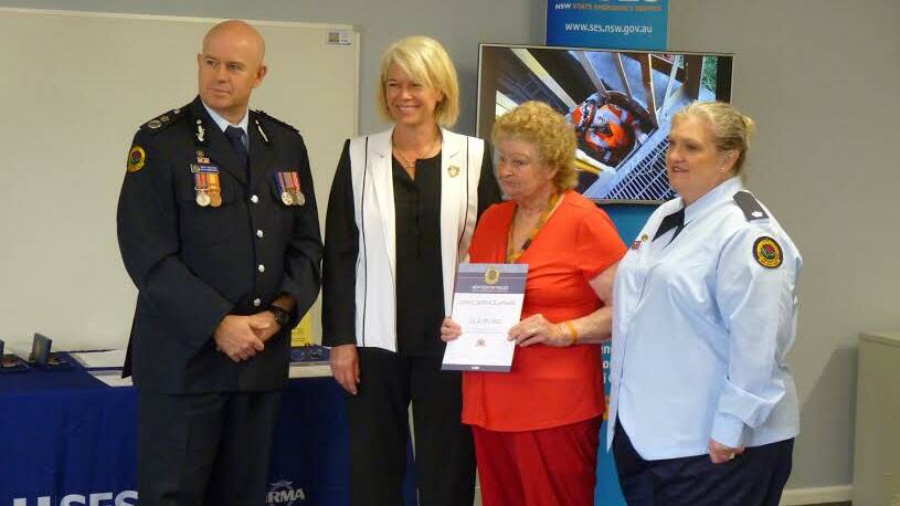 VALID RECIPIENT: (from left) NSW Deputy Commissioner for the SES, Greg Newton, local Member, Katrina Hodgkinson MP with Lila Irving and Ros Bickford.