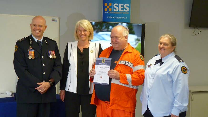 VALID RECIPIENT: (from left) NSW Deputy Commissioner for the SES, Greg Newton, local Member, Katrina Hodgkinson MP with Clyde Smith and Ros Bickford.