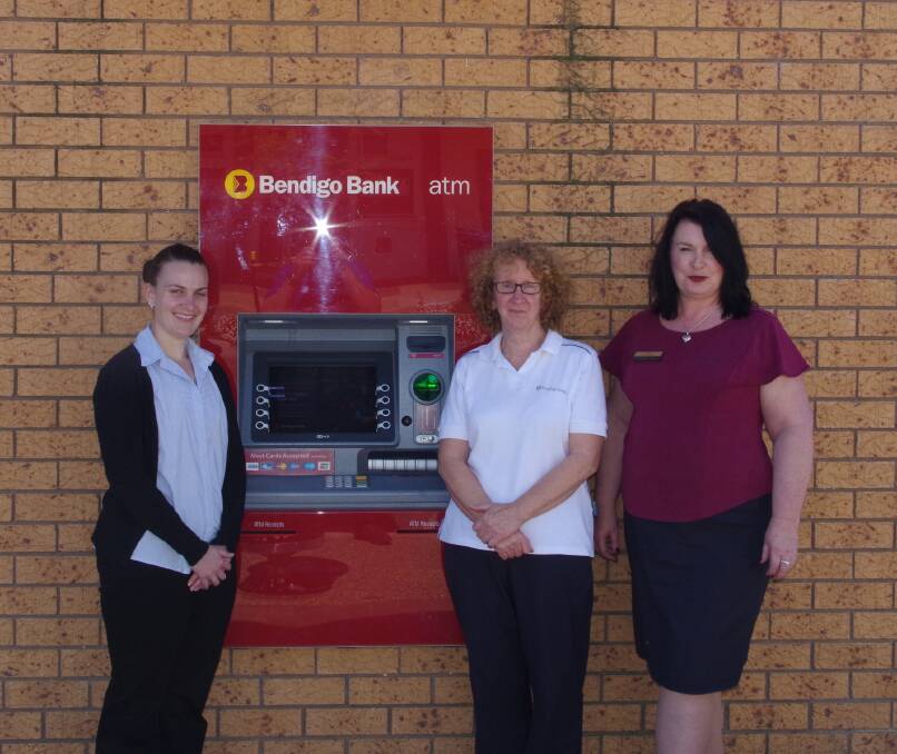 GIVING BACK TO THE COMMUNITY: Bendigo Bank Harden branch staff (from left) Caron Elliott, Gale Curtis and Jen Sheridan. Picture: John McLaurin.