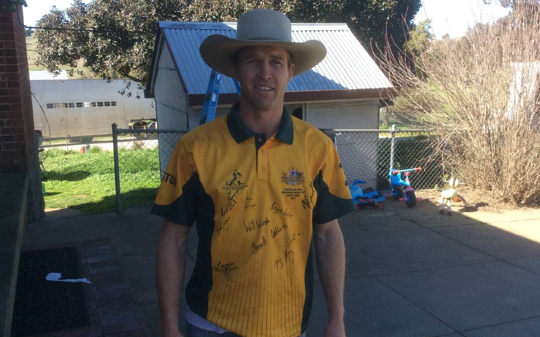 PROUD TO REPRESENT HIS COUNTRY: Champion Jugiong Polocrosse player Will Weston wearing his Australian Polocrosse shirt which is signed by his fellow teammates. PICTURE: John McLaurin.