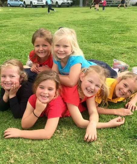 Having fun at the Murrumburrah and Jugiong Public Schools athletics days was (L-R on top) Katie Brooker and Rianna Irving and (L-R on bottom) Lowanna Potts, Sybella Lenehan, Evie Giddings and Hannah Guy.