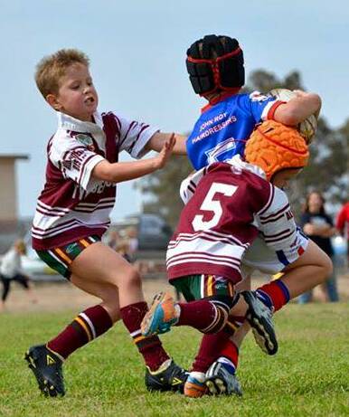 CLASH: Jonah and Lewis were doing the job for the Junior Hawks in the under 8s recently. On Saturday the Harden Junior Rugby League are playing in Wagga. Picture: Deb Trybel.