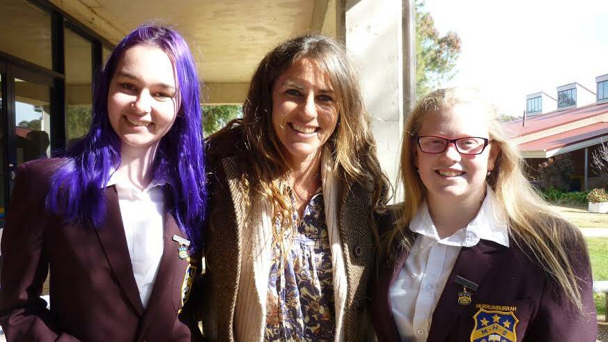 ALL SMILES: (from left) Murrumburrah High School's Winona Gray and Taylah Phillis with Jules Allen (in the middle). 