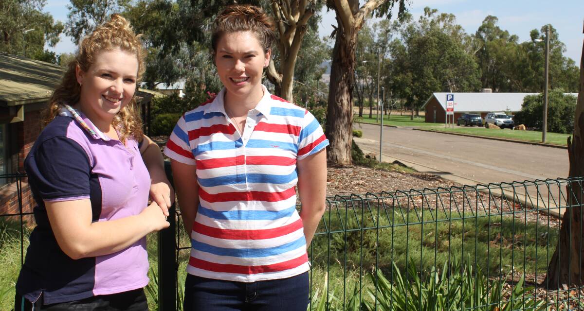 WILLING TO HELP: University students Toni Brown of Temora and Naomi Bernthaler of Harden support the Burrumbuttock Hay Runners. Picture: Nikki Reynolds