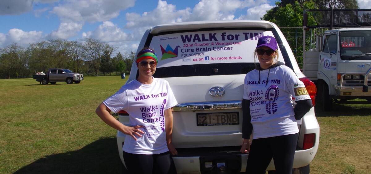 Cherry Queen Entrant Jacqui Everdell and Natasha Batinich after the 29km walk to raise money for the Cure for Brain Cancer Foundation last Saturday in Wombat.