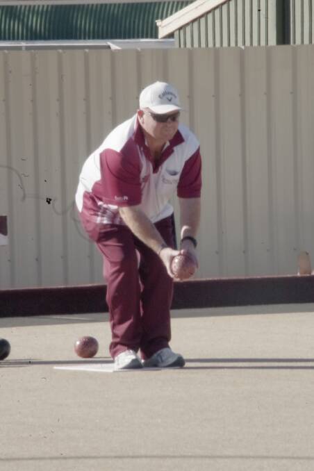 Chris Hocking lines up his shot on Saturday. He and  partner Craig Phillis took out the semi-finals of the Pairs Championship. The finals will be held this coming Sunday.