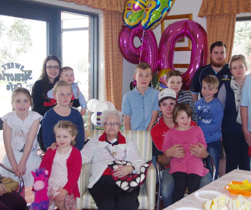 FAMILY FIRST: Audrey Hughston surrounded on her special day, by her grandchildren and great-grandchildren. 