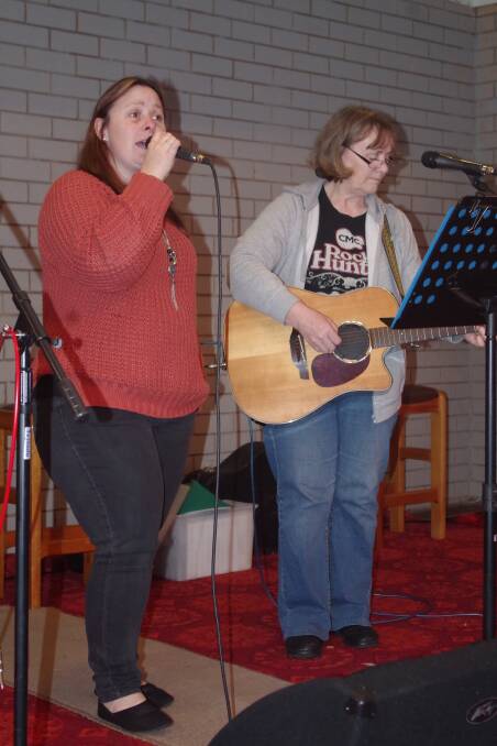 Singing up a storm - Michelle Severs belts out a beautiful country ballad accompanied by Kerrie Summerfield on acoustic guitar.