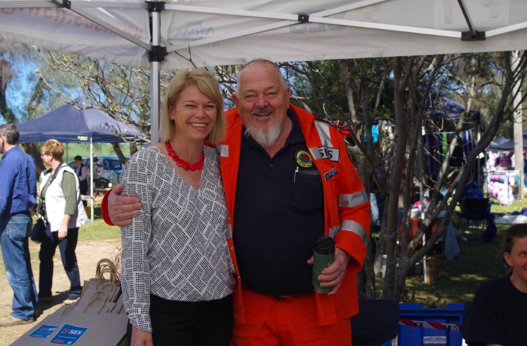 REAL LIFE HERO: Member for Cootamundra, Katrina Hodgkinson takes time out to chat with SES member Brian Farnsworth.