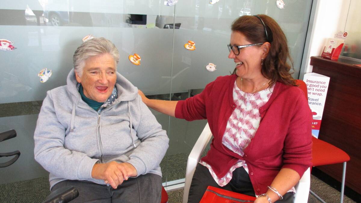Denise Coble shares a joke with Harden's Community Bank Branch Manager Allyson Wales at the Biggest Morning Tea. Photo by Erica Menz