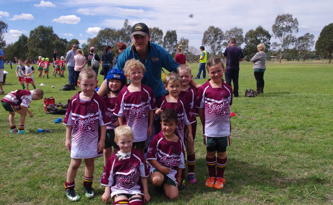 FOOTY FEVER: The Under 6 Junior Rugby League Team and their coach played their very first match against the Wagga Wagga Brothers team on Saturday.