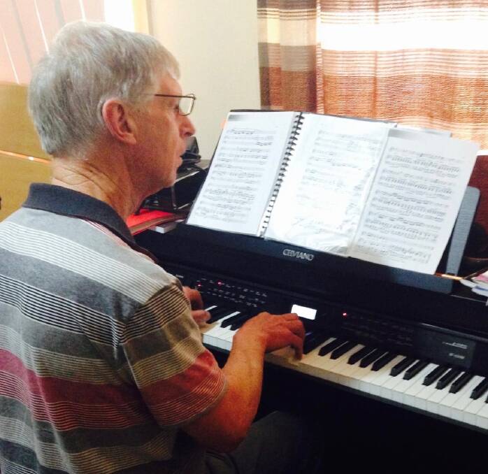 Stewart Bruce busy rehearsing for the fundraiser concert as accompanist and
soloist.