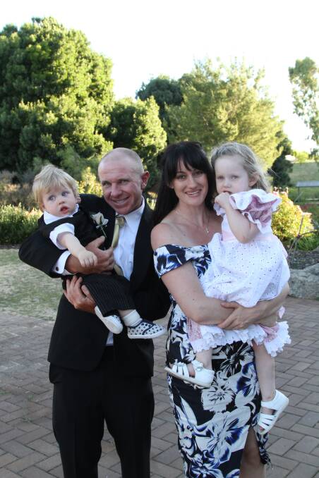 Happier Times: William, Adam, Kathie and Annabelle Potts in Murrumburrah at a family wedding in December. Picture: Paula Butt