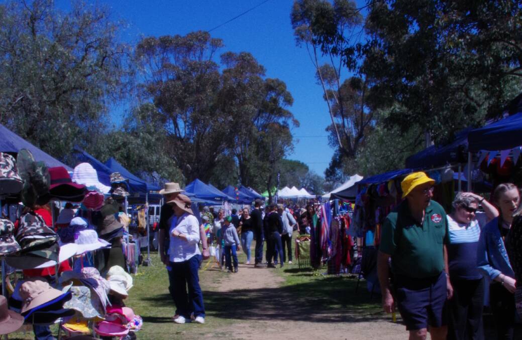 TO MARKET, TO MARKET: The market stalls proved to be very popular with the mums and dads