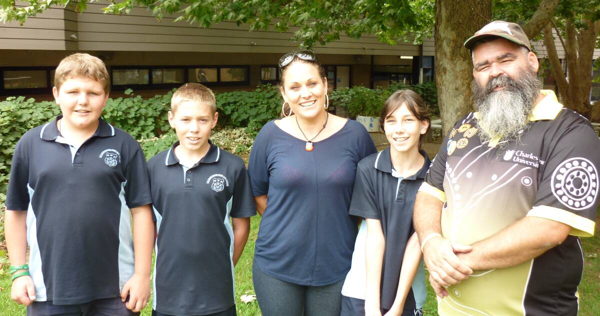 LEARNING EXPERIENCE: Students Oscar Killick, James Daley and Kasey Jones are among those who had a chance to learn from Wiradjuri language tutors Aunty Letetia Harris and Uncle Harry Lambshead. Picture: Murrumburrah High School