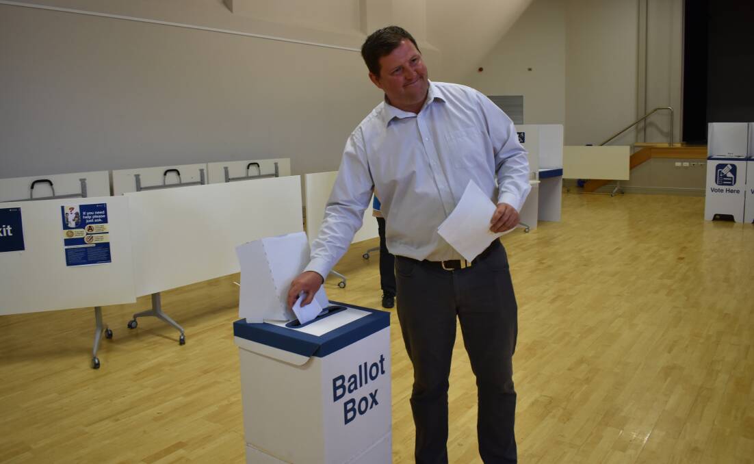 Cootamundra Shooters, Fishers and Farmers hopeful Matthew Stadtmiller casts his vote in Young on Saturday.