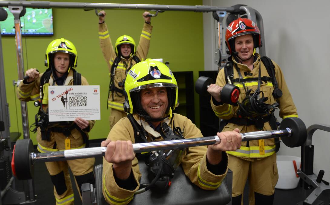 CHALLENGE: Young Fire & Rescue NSW members Don Thomas, Sam Woods, deputy captain Dick Donges and captain Ryan Terry training for the climb. Photo: Elouise Hawkey
