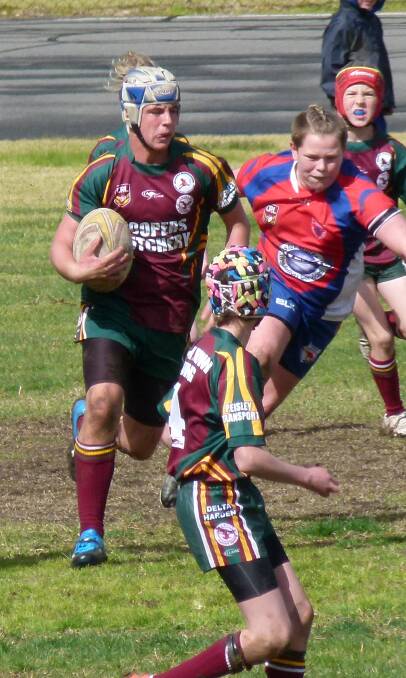 ON THE HOP: Under 13s star Joie Whybrow makes a break to score.