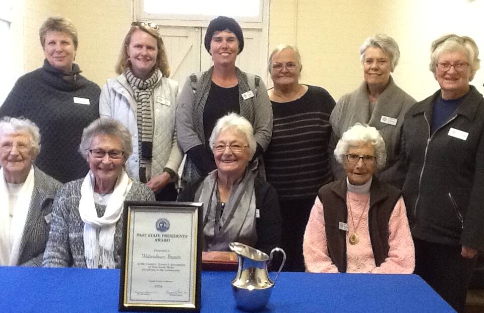 RECOGNISED: Some of the Wallendbeen CWA members with the branch's award from the 94th CWA State Conference in Cowra.