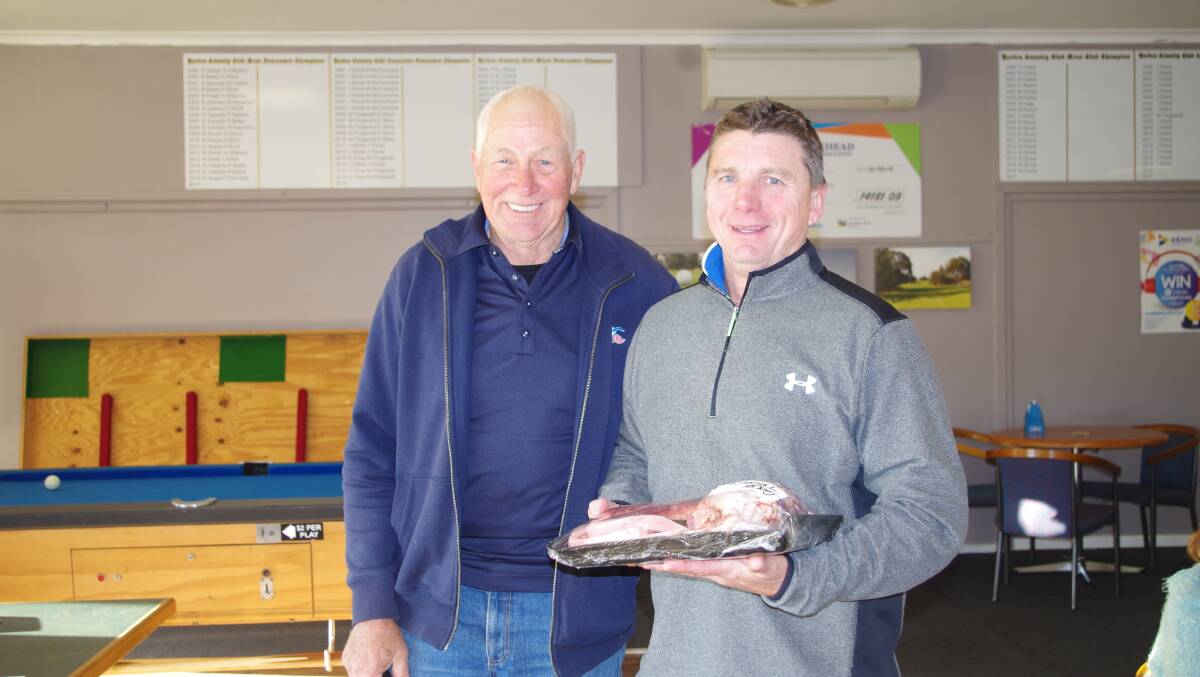 MEAT MAN: Ron Page presents Craig Henman with a meat tray from Coopers Choice Cuts Butchery. Picture: Lorri Roden