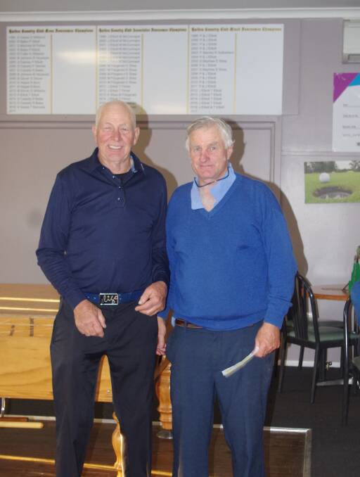 DAY ON THE GREEN: Ron Page presents Ric Preston with the winnings for his individual result of 39. Picture: Jody Potts