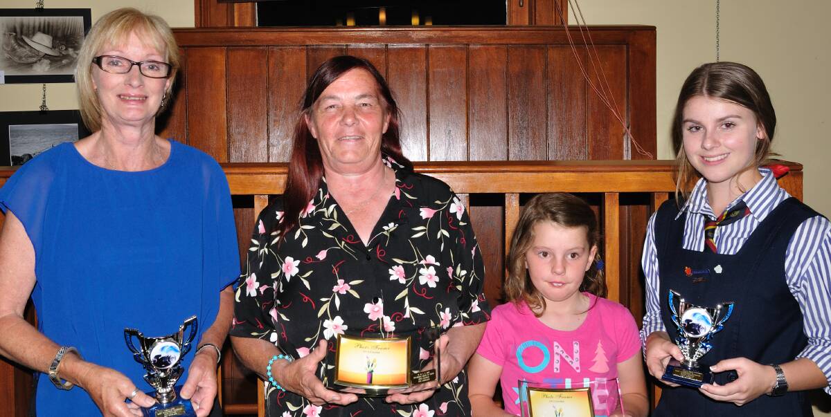 WINNERS: Proud to be part of the Harden Murrumburrah Camera Club exhibition are major winners (from left) Gail Douglas, Sue Stibbard, Samantha Beal and Nikki Sargent. Picture: Contributed