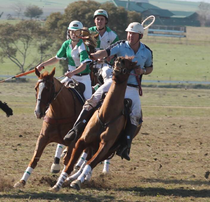 LOCAL DERBY: Harden and Jugiong polocrosse players are in the thick of the action on Saturday at the Harden Racecourse in a fun local rivalry. Picture: Jennette Lees 
