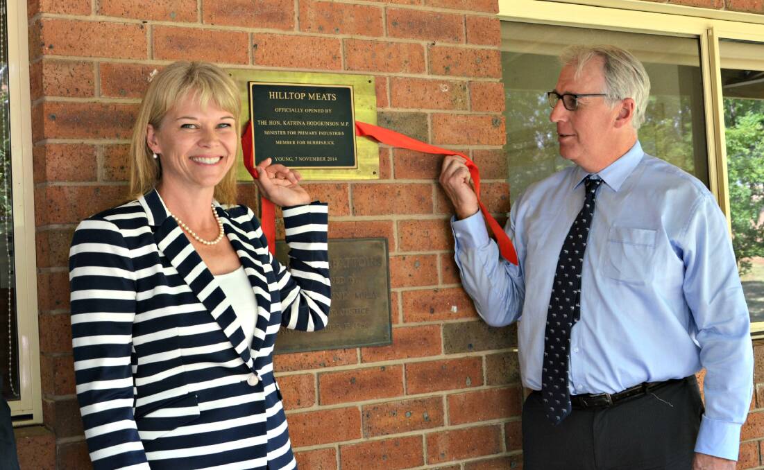 OPEN: Member for Cootamundra Katrina Hodgkinson and B E Campbell principal Ted Campbell at the opening of the new Hilltop Meats processing plant in Young in 2014. 