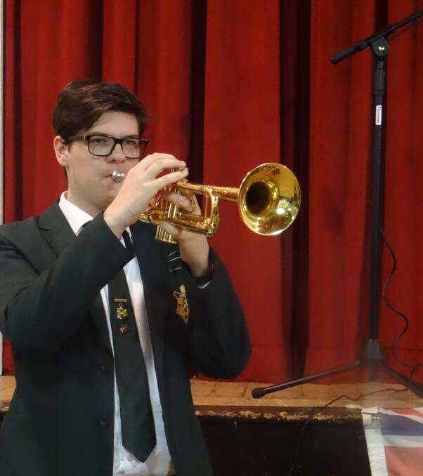 SOMBRE: Bugler Hayden Dalton from Epping Boys High sounds the Last Post at the Wallendbeen Anzac Day Service.