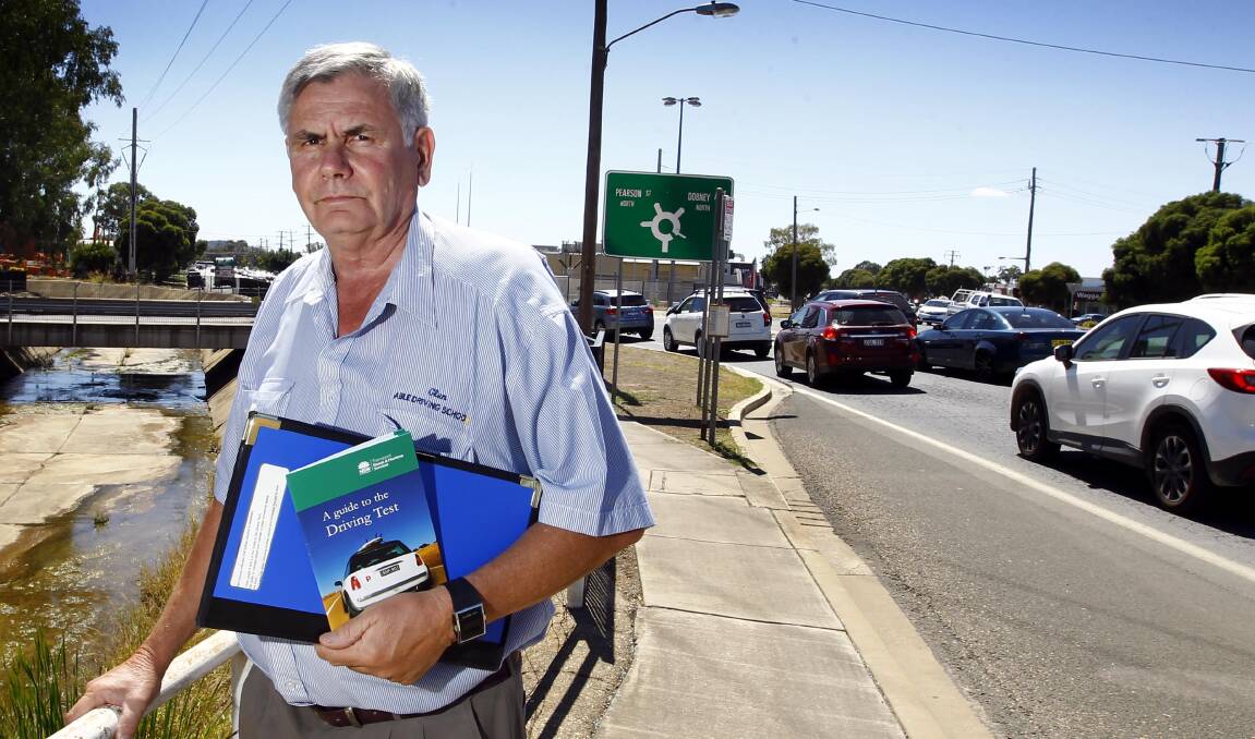 STAY SAFE: Driving instructor Glen Gaudron says everyone should make sure they're up to date with the road rules, especially if they're teaching teenagers to drive. Picture: Les Smith.