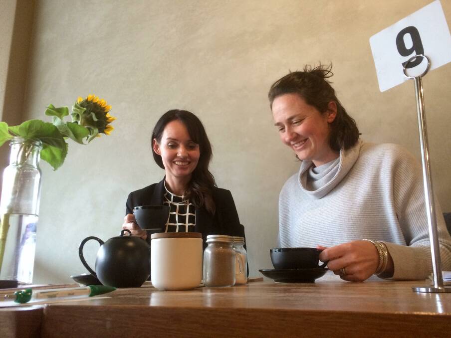 TRANSFORMED: Entrepreneurs Michelle Bray and Jo Palmer can conduct business over coffee thanks to technologically-advanced ways of working outside a traditional office.
