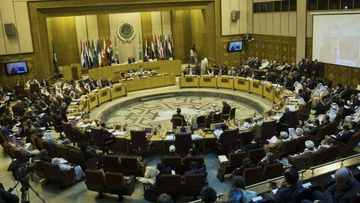 Foreign ministers take their seats at the Arab League headquarters in Cairo on Sunday.  Photo: Hassan Ammar