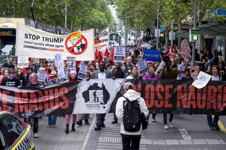 MELBOURNE, AUSTRALIA - FEBRUARY 18:  Protesters are seen during the 'No to Trump and Turnbull - Let The Refugees In' rally on February 18, 2017 in Melbourne, Australia.  (Photo by Luis Ascui/Fairfax Media)