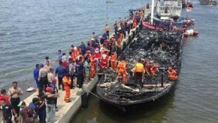 The charred boat, Zahro Express, after it was returned to port in Jakarta on New Year's Day. Photo:  Indonesian National Board for Disaster Management/Twitter