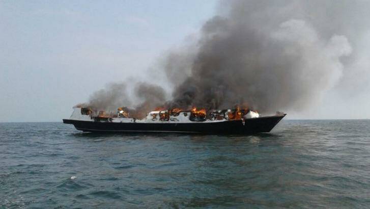 The Zahro Express ablaze at sea about 20 minutes after leaving port in Jakarta on New Year's Day.  Photo:  Indonesian National Board for Disaster Management/Twitter