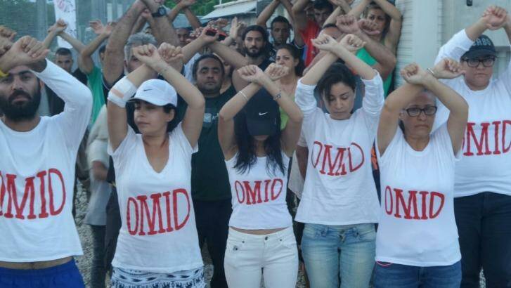 Refugees at Nauru wear t-shirts with Omid's name as a show of solidarity.