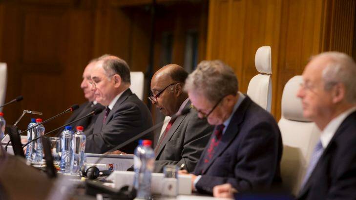 Thomas Mensah, centre, president of the five judge tribunal ruling on the arbitration case between the Philippines and China in the South China Sea. Photo: Permanent Court of Arbitration, The Hague