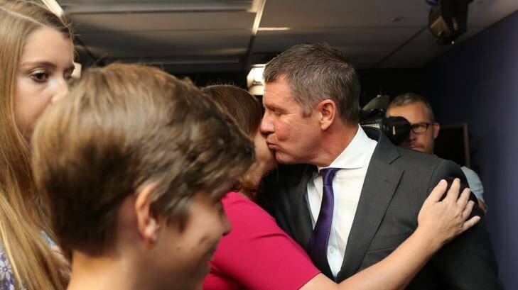 The Premier's "lifeline": Mike Baird kisses his wife, Kerryn. Photo: Janie Barrett