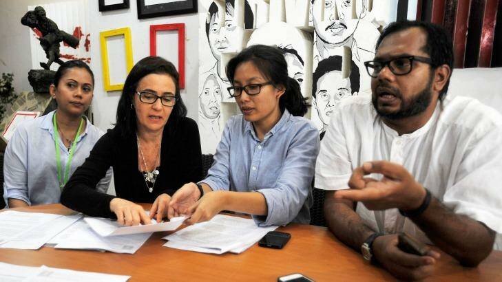 Haris Azhar (right) with colleagues from the Commission for the Disappeared and Victims of Violence (Kontras) and Brazilian woman Angelita Muxfeldt plead for the life of Angelita's cousin Rodrigo Gularte in Jakarta, February 2015. Gularte was executed alongside Andrew Chan and Myuran Sukumaran in April last year.  Photo: Jefri Tarigan