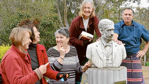 Local Binalong folk get into the poetry mood.  Pictured with the statue of Banjo Paterson in Pioneer Park, Binalong are (l to r) Lizz Murphy, Vicki Royds, Denise Wilson, Robyn Sykes and Mick dal Santo. 