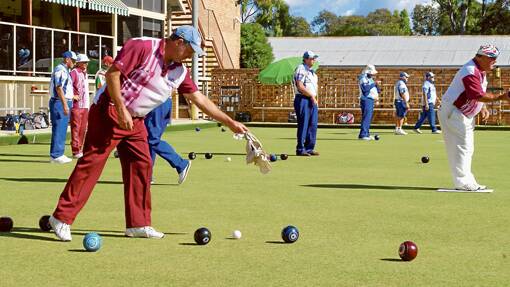 Rod James watches the bowls line-up in Sunday's pennant match against the Cootamundra Ex Services team. 