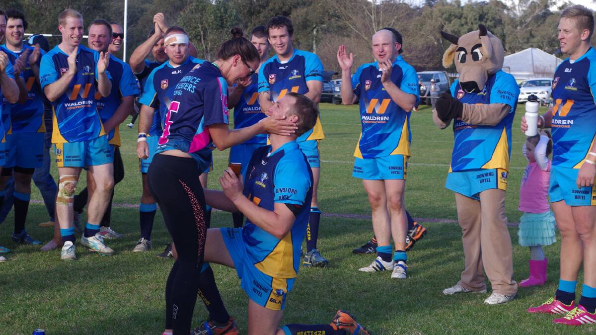 Ben Spencer went down on his knee and proposed to long term girl friend Ally Giles after the Binalong Brahmans won the George Tooke Shield grand final on Saturday. Ally's team, the Binalong Jersey Girls, won the George Tooke Shield touch competition.