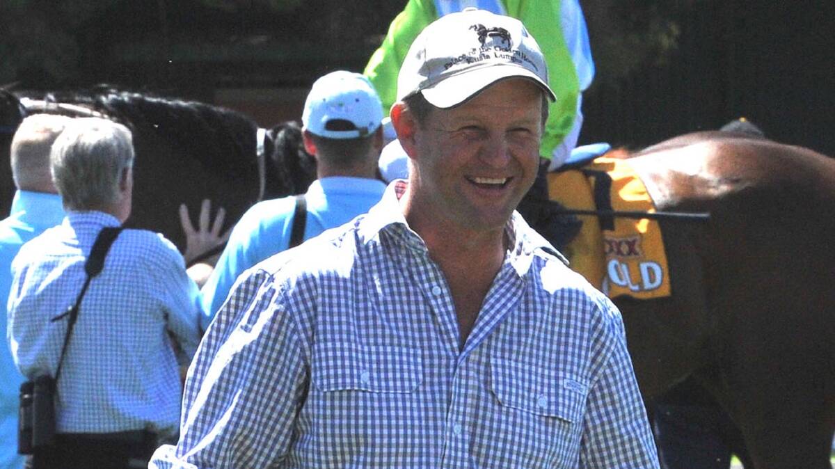 Trainer Chris Heywood was all smiles after his horse Dantains Spirit won race
one at Wagga on Saturday. Photo: Laura Hardwick