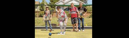 Enjoying a game of mufti bowls in the sunshine for Can Assist on Sunday are, from left, Carol Barker, Vicki James, Tim Byrne and Laurie Monaghan.