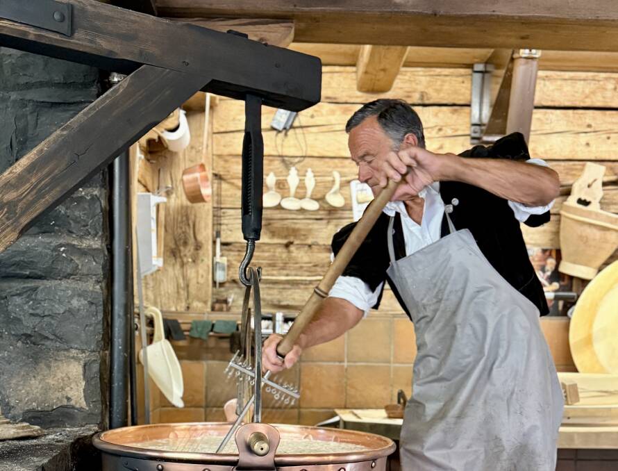 Watching Michel Mottier make traditional alpine cheese at Le Chalet. Picture by Julia D'Orazio