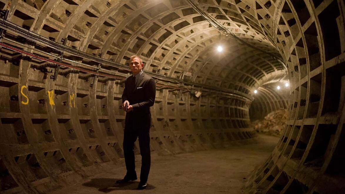 Daniel Craig as 007 in a disused tunnel. 