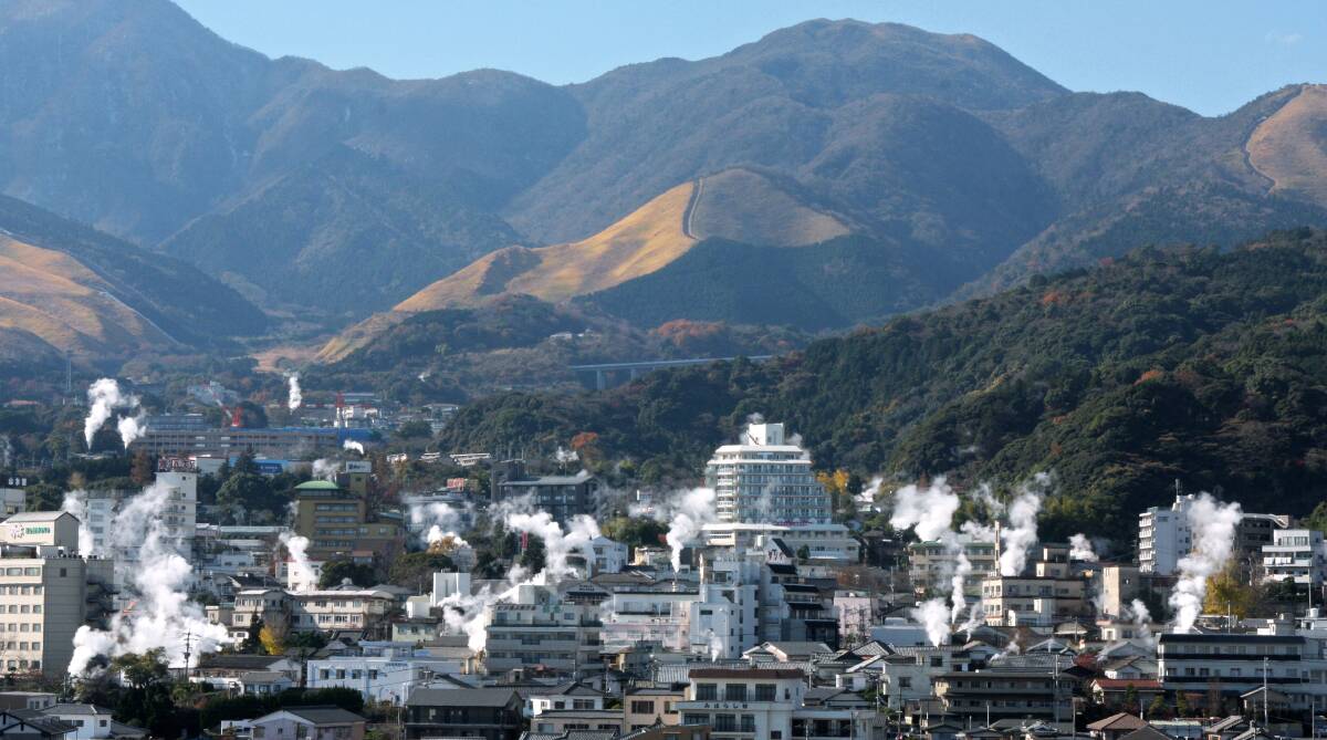 Steam rising off hot springs in Beppu. Steam rising off hot springs in Beppu.