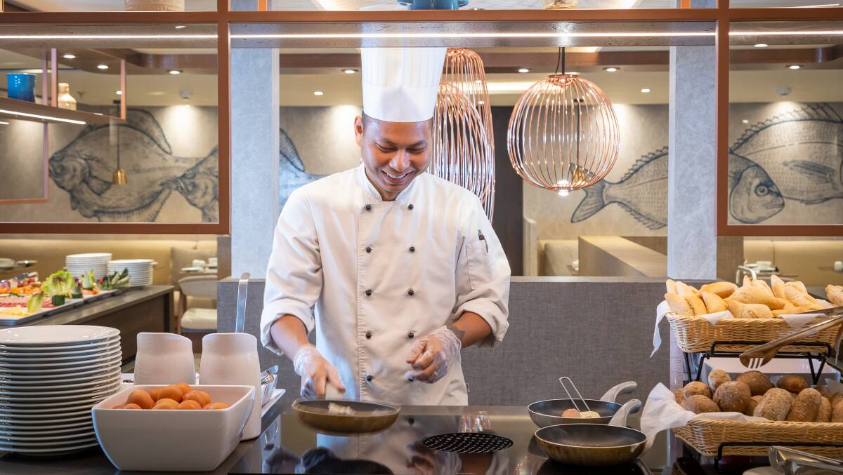 A chef at work in the kitchen.