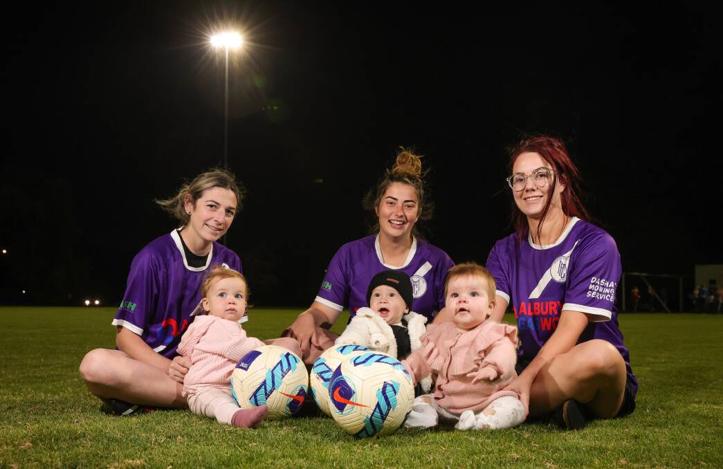 PURPLE ARMY: Melinda Wilson, Scarlett Moran, Alex and Mex Waters, Michele Bent and Mae Andrews are preparing to spend Mother's Day together. Picture: JAMES WILTSHIRE